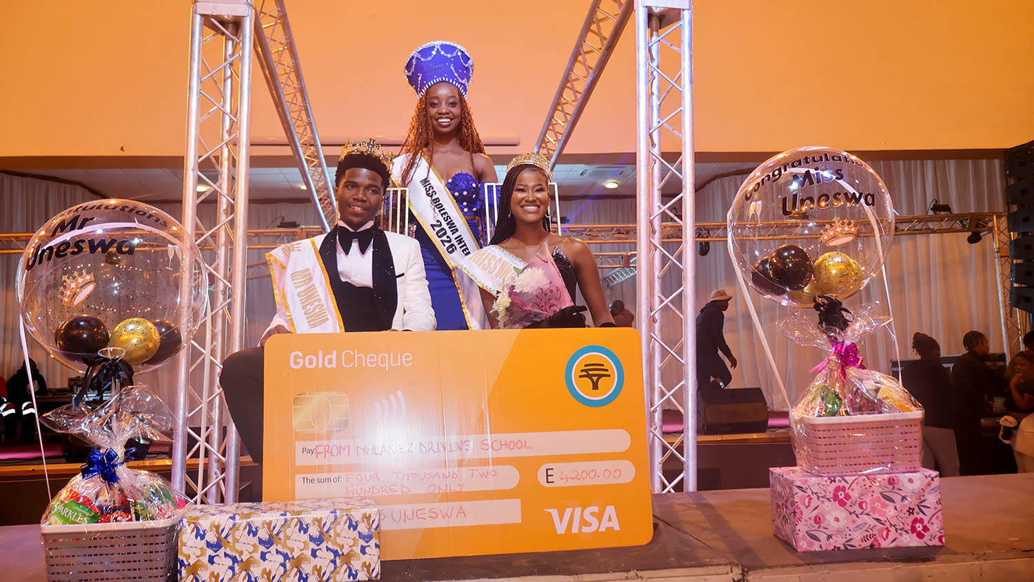 Blessing Simelane and Sihlelelwe Dlamini with Miss BOLESWA Intervarsity 2026, Angel Zubuko. The pagent winners also received driving lessons sponsorship from Nhlanez Driving school, with the King receiving heavy duty sponsorship and the Queen receiving light duty. (Pics: Neliswa Sibiya)